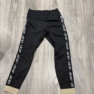 Nike  Black Leggings with Gold Trim